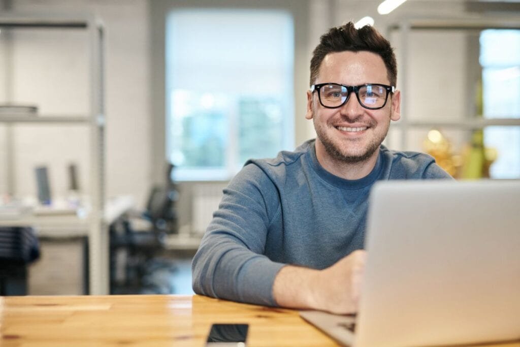 A man wearing durable and comfortable eye glasses from EZ Contacts
