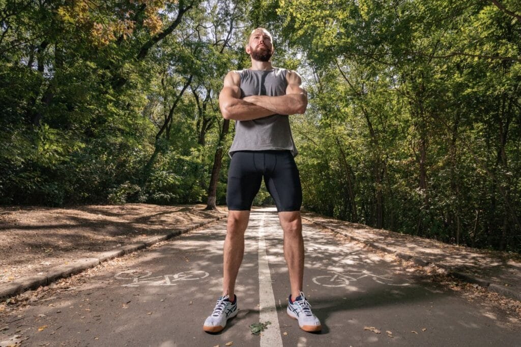 A man wearing Asics shoes and sports wear bought from JD sports