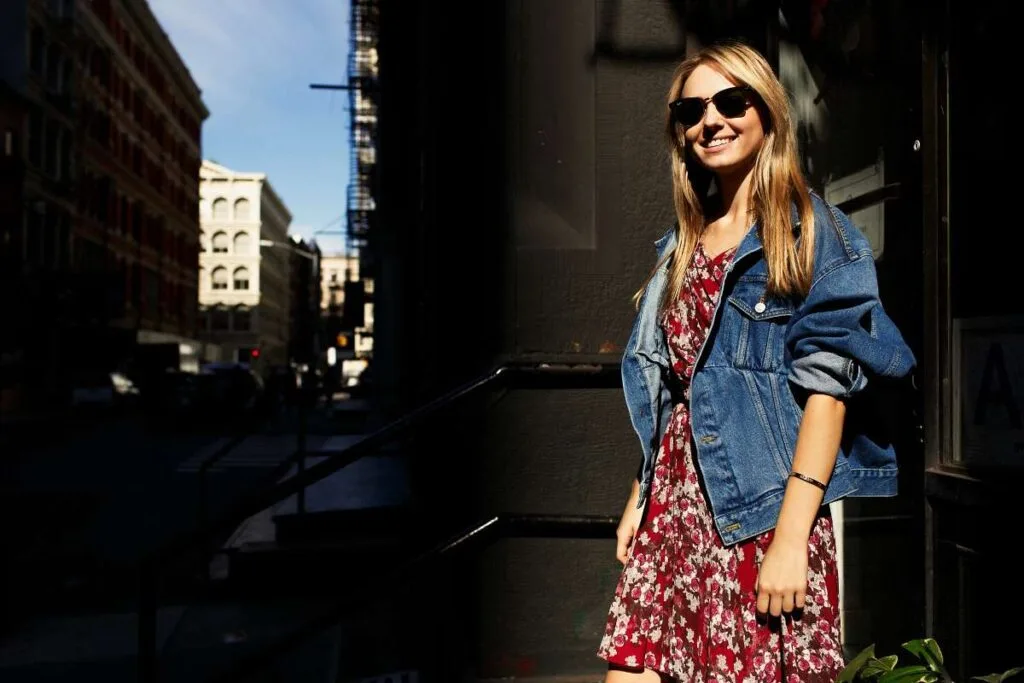 Woman dressed in cool dress and denim jacket