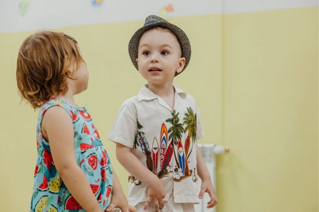 A boy and a girl in vibrants kids clothes
