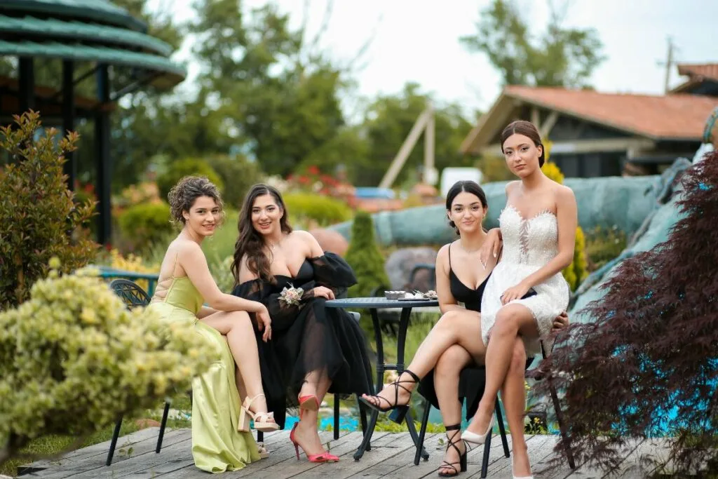 A group of women wearing elegant dresses